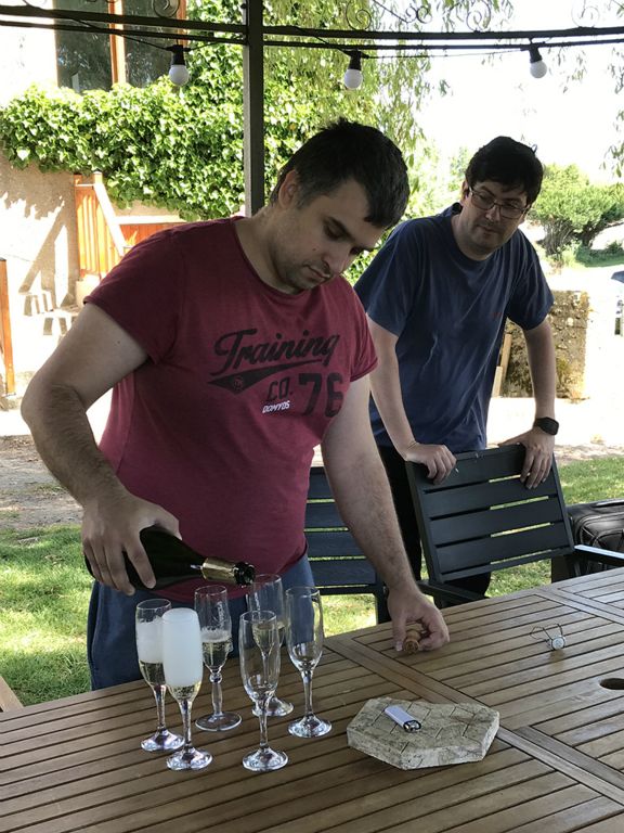 Paul, Nicholas and their friend Williams (not in photo) shared their bottle of champagne with us and the hosts of the Ferme Historique Jean de la Fontaine
